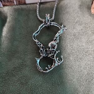 Silver Double Kiss Skull Pendant